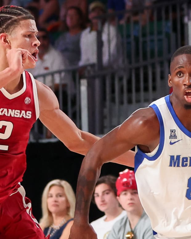 Razorbacks' Trevon Brazile guarding Memphis' David Jones at The Battle 4 Atlantis